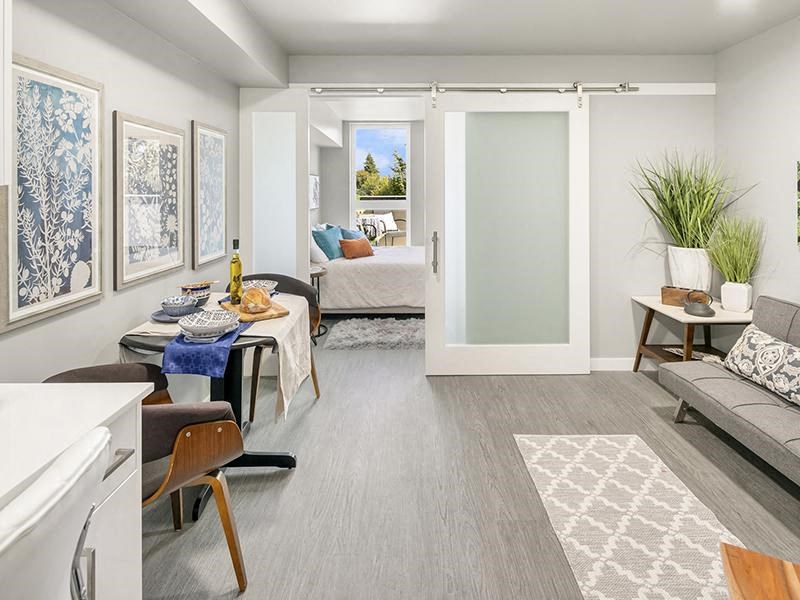 a living room with a couch and a table