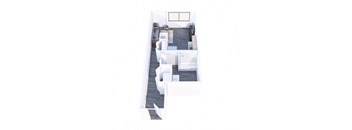 A white room with a couch and a table.