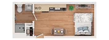 A bedroom with a bed, nightstand, and a plant.
