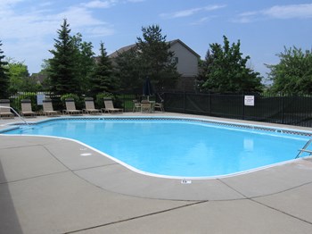 Heated Pool, with plenty of lounge chair sunning, umbrella tables, and shower locker rooms and private restrooms. The Playground and picnic area is located just outside the pool area. Heated Pool, with plenty of lounge chair sunning, umbrella tables, and shower locker rooms and private restrooms. The Playground and picnic area is located just outside the pool area. - Photo Gallery 5