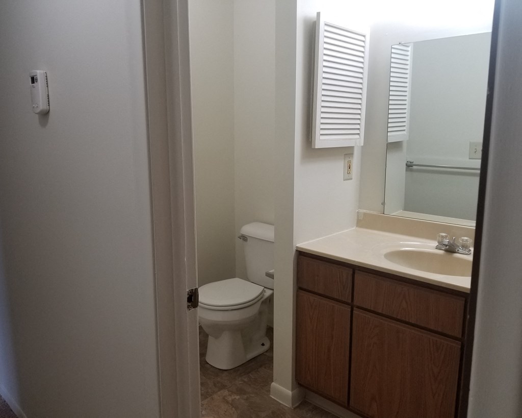 a small bathroom with a toilet and a sink