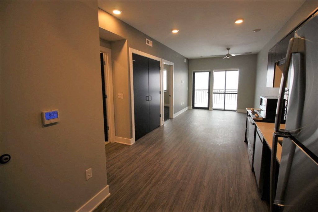 a living room and hallway of a new apartment