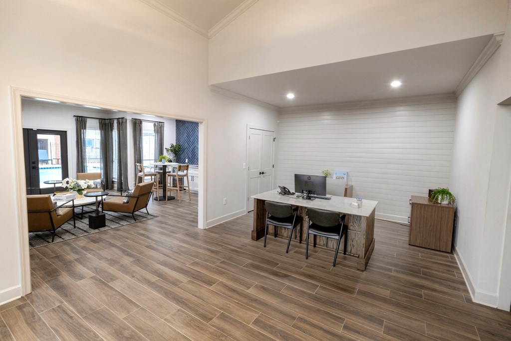 an open living room and dining room with a table and chairs