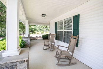 rocking chair front porch of clubhouse - Photo Gallery 4