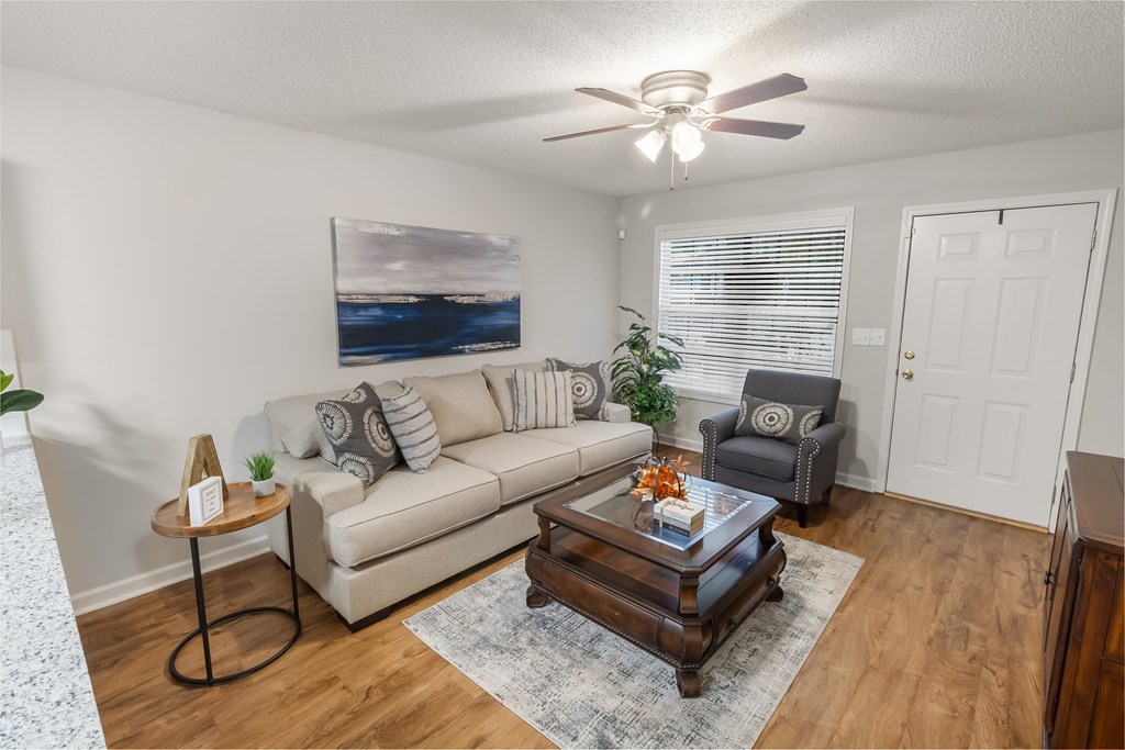 a living room with a couch and a coffee table