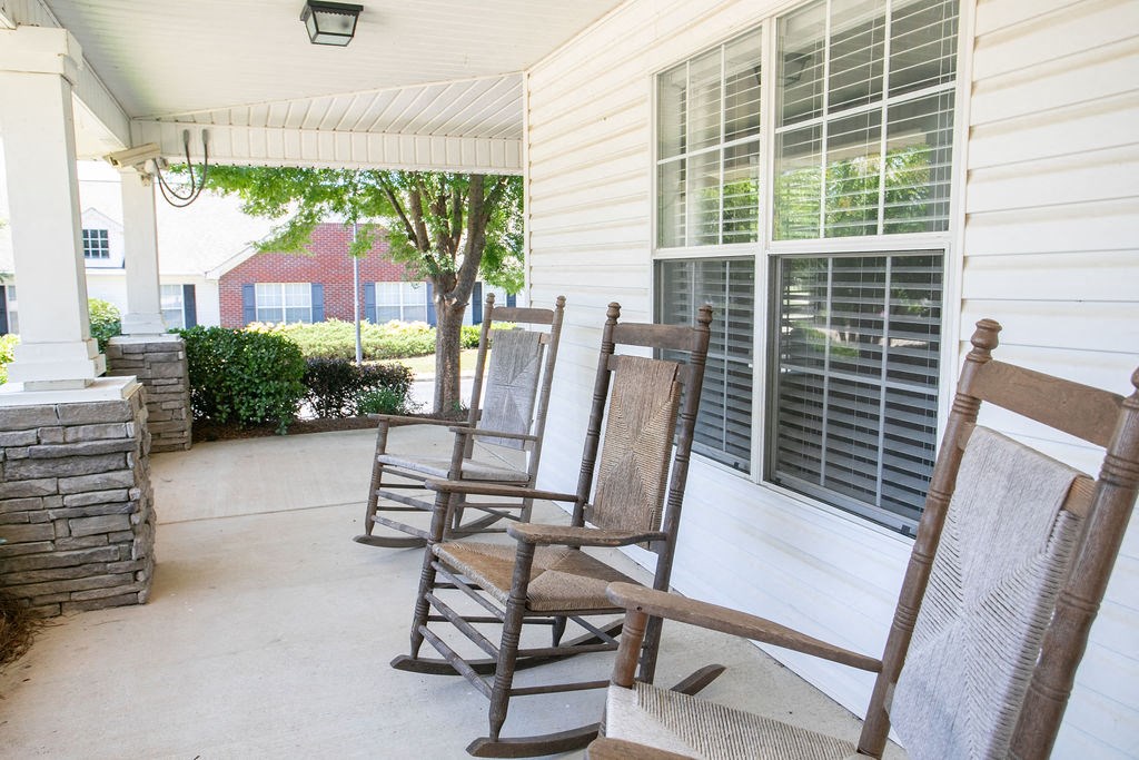 rocking chairs on front porch of clubhouse