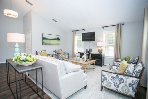 a living room with a couch and a table
