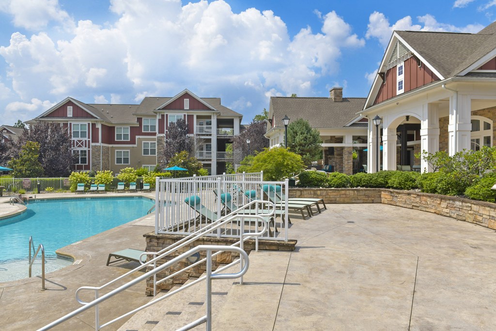 the estates at tanglewoodpool with clubhouse and resort style buildings
