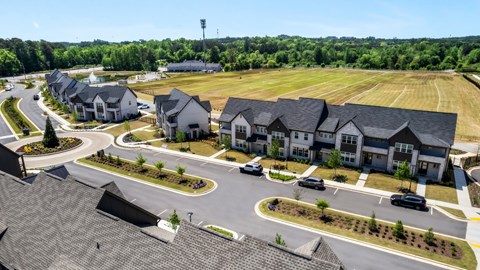 A suburban neighborhood with houses and a park.