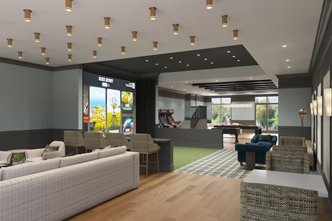 A modern living room with a white sofa and a television.