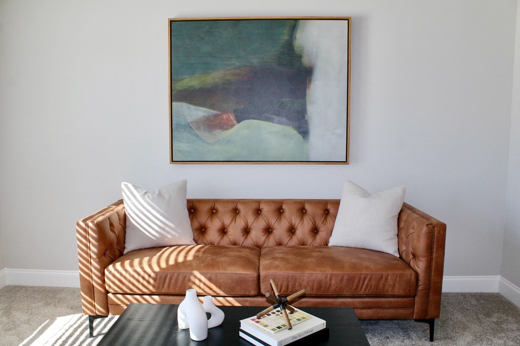 a living room with a couch and a coffee table
