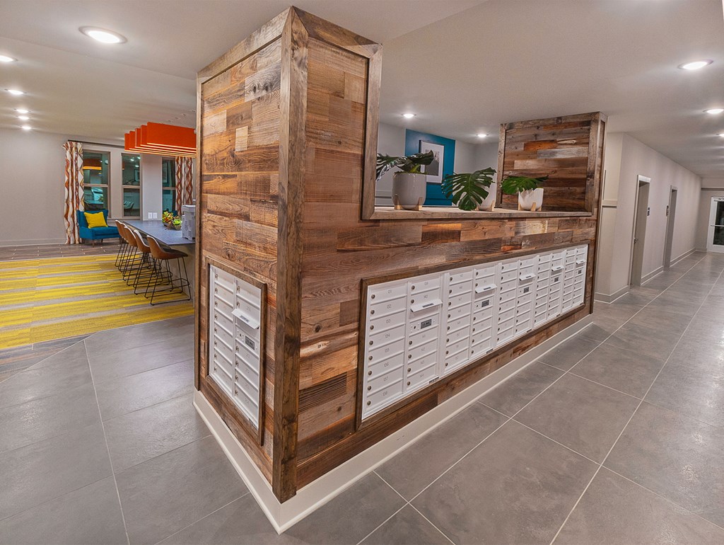 the lobby of a building with a wooden wall and drawers
