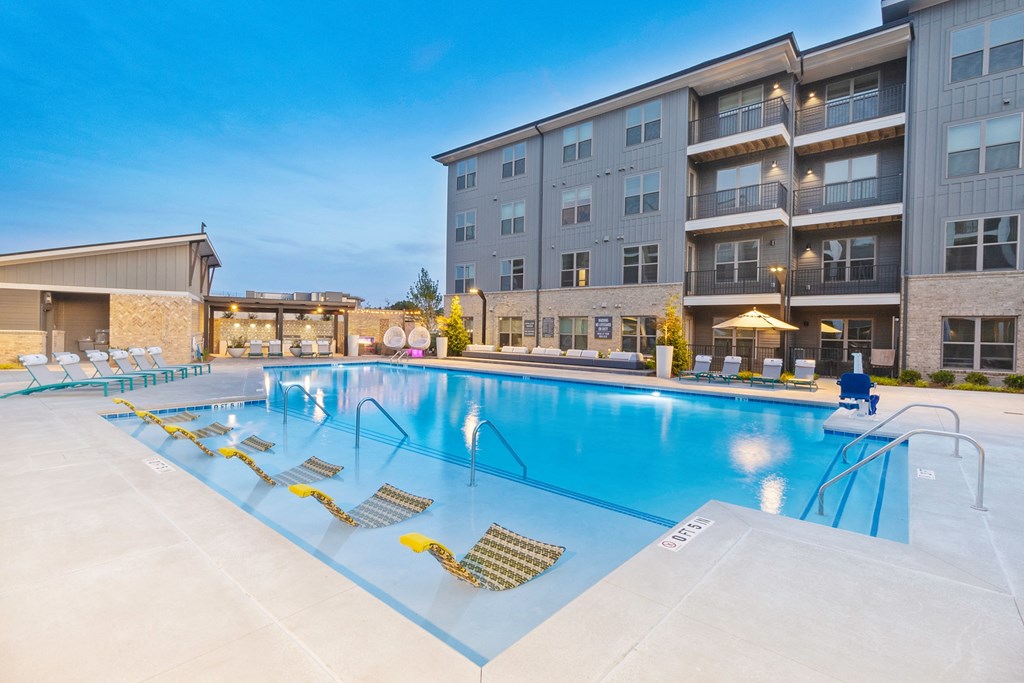 our apartments have a large resort style pool with lounge chairs