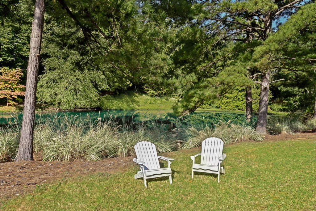 2 chairs at lake at Lullwater at Calumet, Newnan