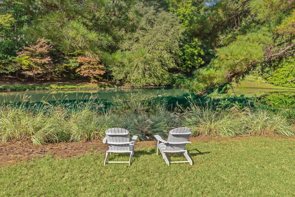 2 chairs at lake at Lullwater at Calumet, Newnan