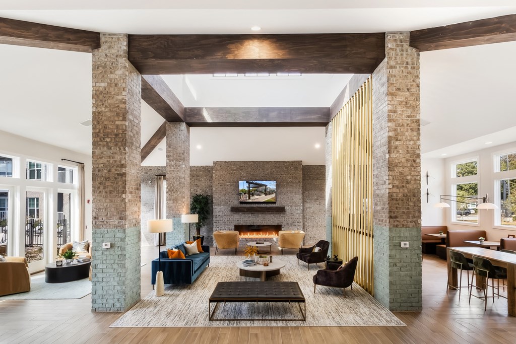 a living room with a fireplace and a large open space