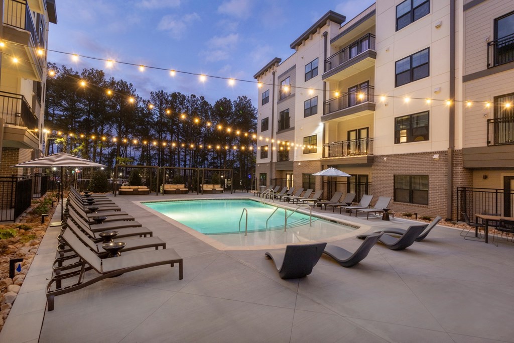 our apartments have a swimming pool and lounge chairs at night