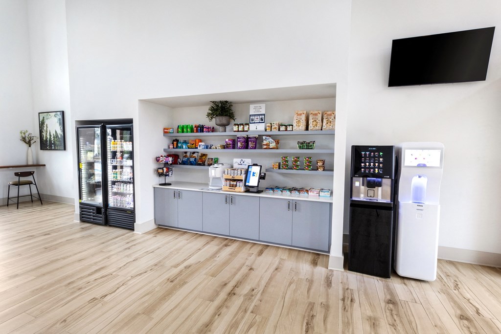 a display case in a store with curved walls and a wood floor