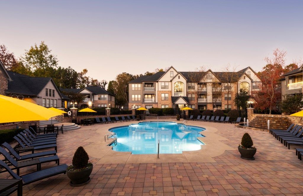 our apartments offer a swimming pool at dusk at The Reserve at Sugarloaf Apartments, Georgia