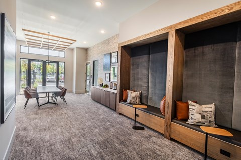 a living room with a couch and a dining room table