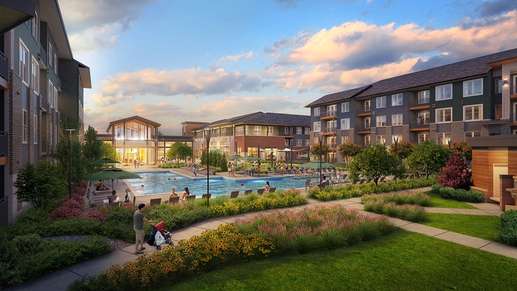 A beautiful outdoor scene of apartment buildings with a pool and people enjoying the sunset.