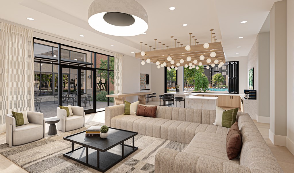 A modern living room with a large sectional sofa and a coffee table.