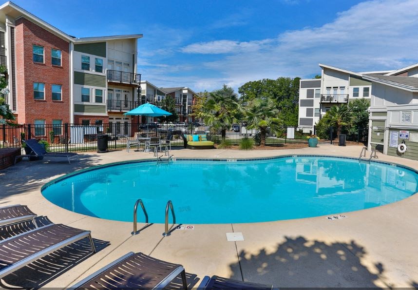 pool with lounge chairs