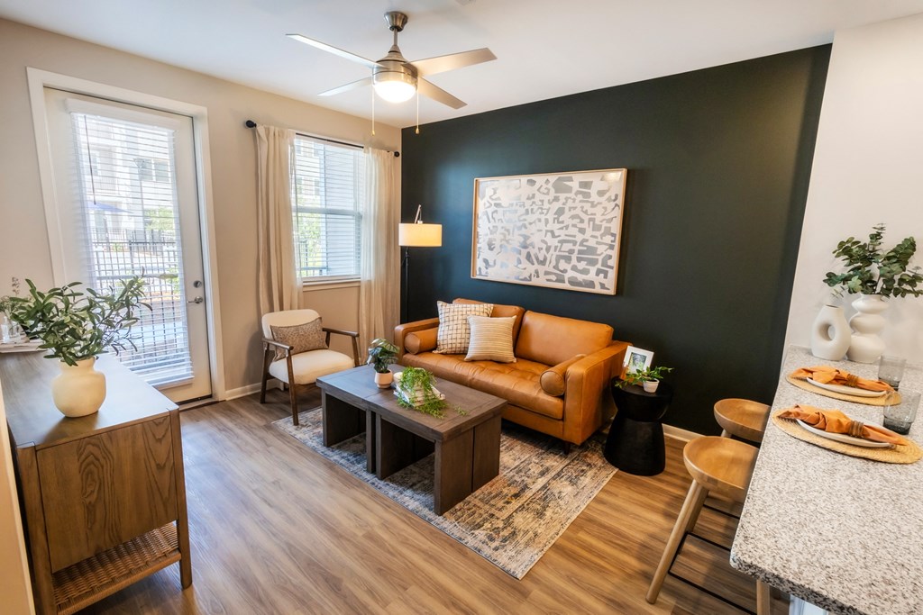 a living room with a couch and a table