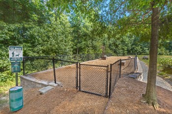 our apartments showcase a dog park with kennels - Photo Gallery 22