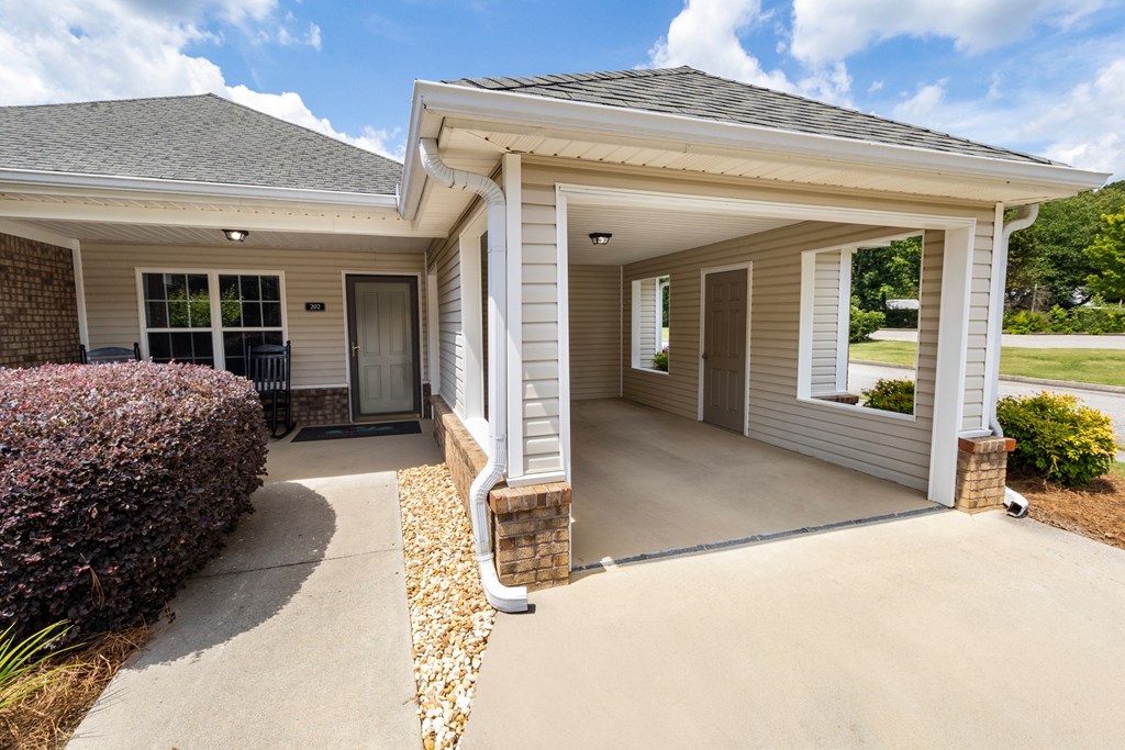 a house with a concrete driveway