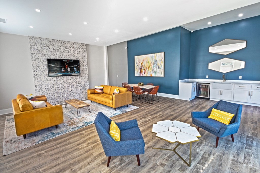 Clubhouse Lounge Seating with television at Grayson Park Estates, Georgia, 30017