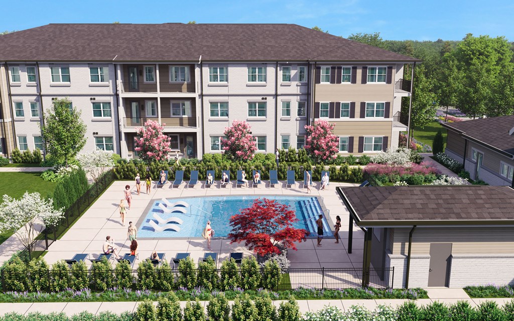 an aerial view of an apartment building with a swimming pool