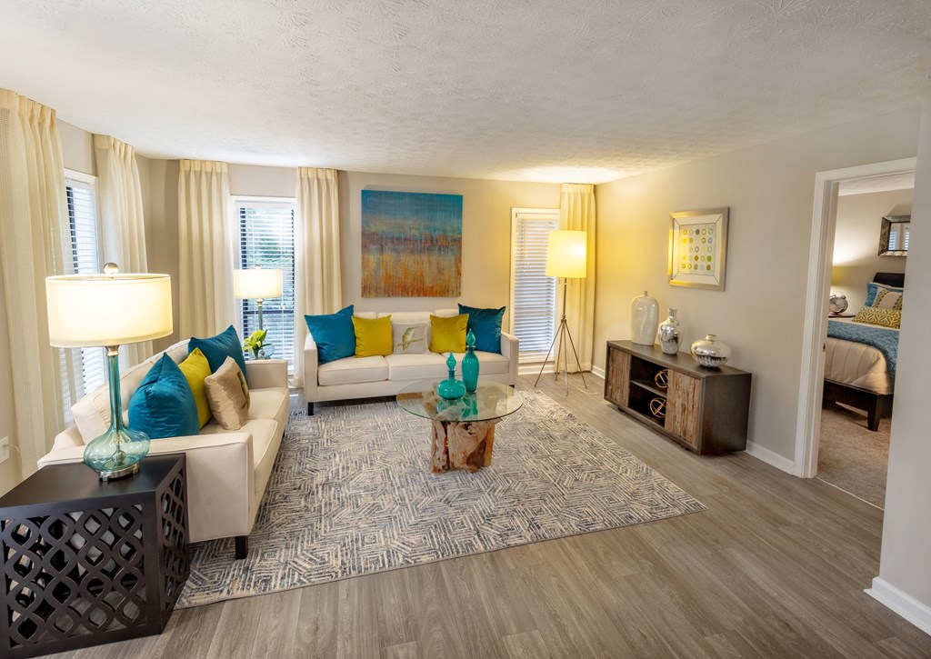 a living room filled with furniture and a large window at Seven Pines, Alpharetta, GA