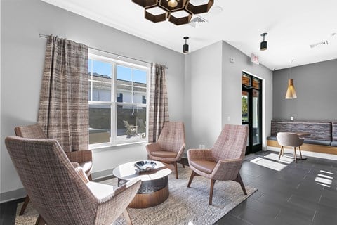 A living room with a brown chair and a brown table.