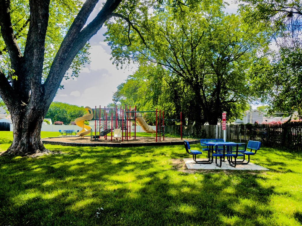 a park with a playground and a picnic table a park with a playground and a picnic table at Glen Hollow, Pennsylvania