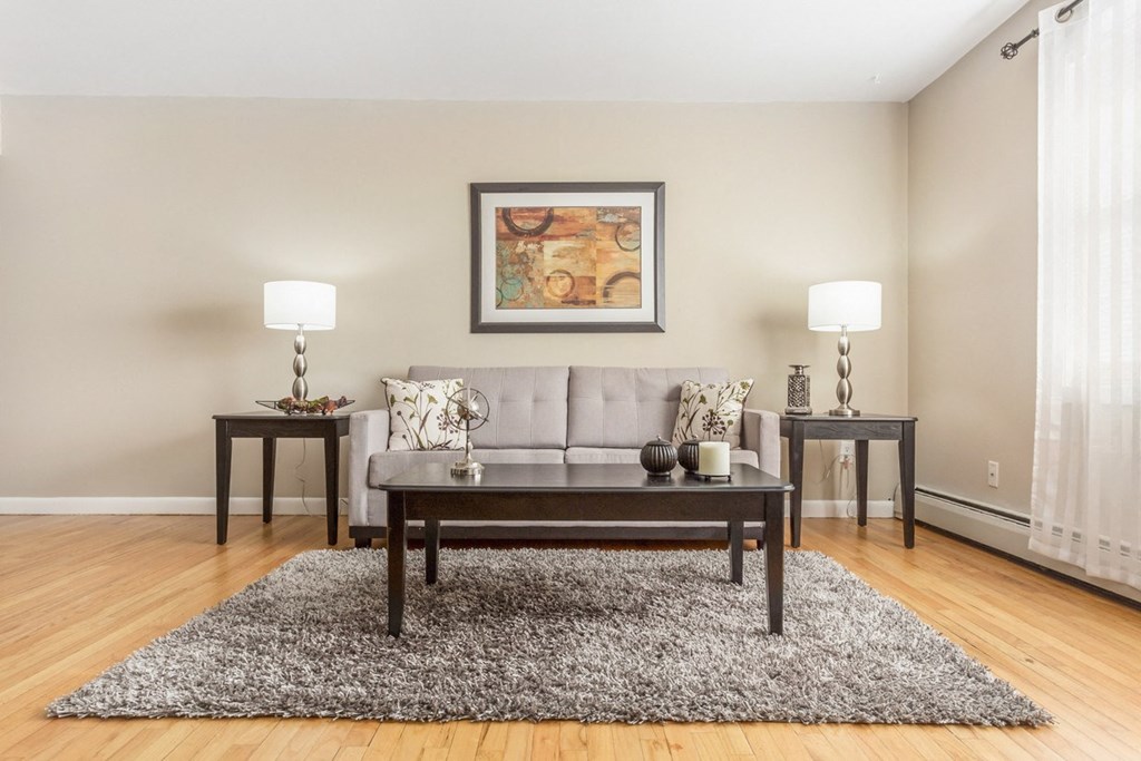 Living room with a couch and a coffee table at Griswold Gardens in Glastonbury, CT, 06033