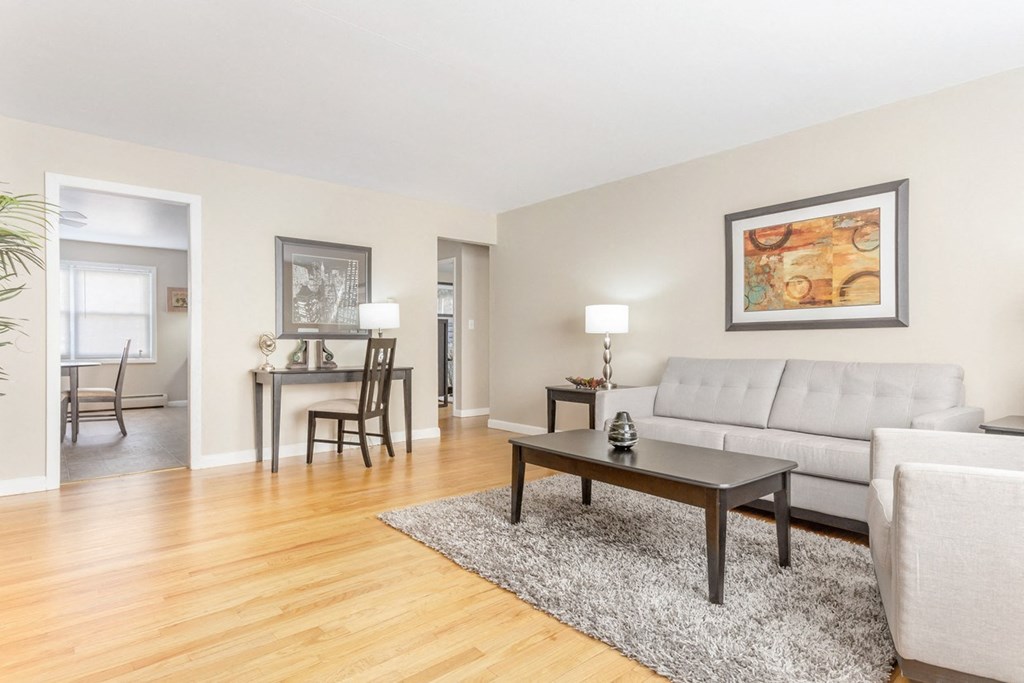 Living room with a couch and a coffee table at Griswold Gardens in Glastonbury, CT, 06033