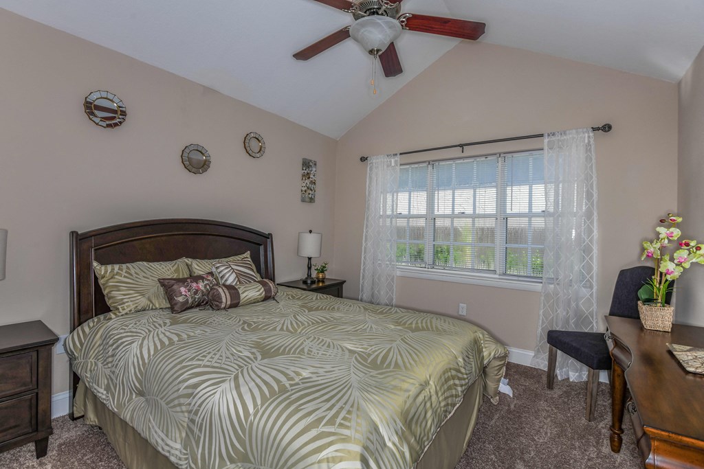 Bloomingdale Woods Apartments Valrico Florida Bedroom with Vaulted Ceiling and Ceiling Fan and Windows with Furniture