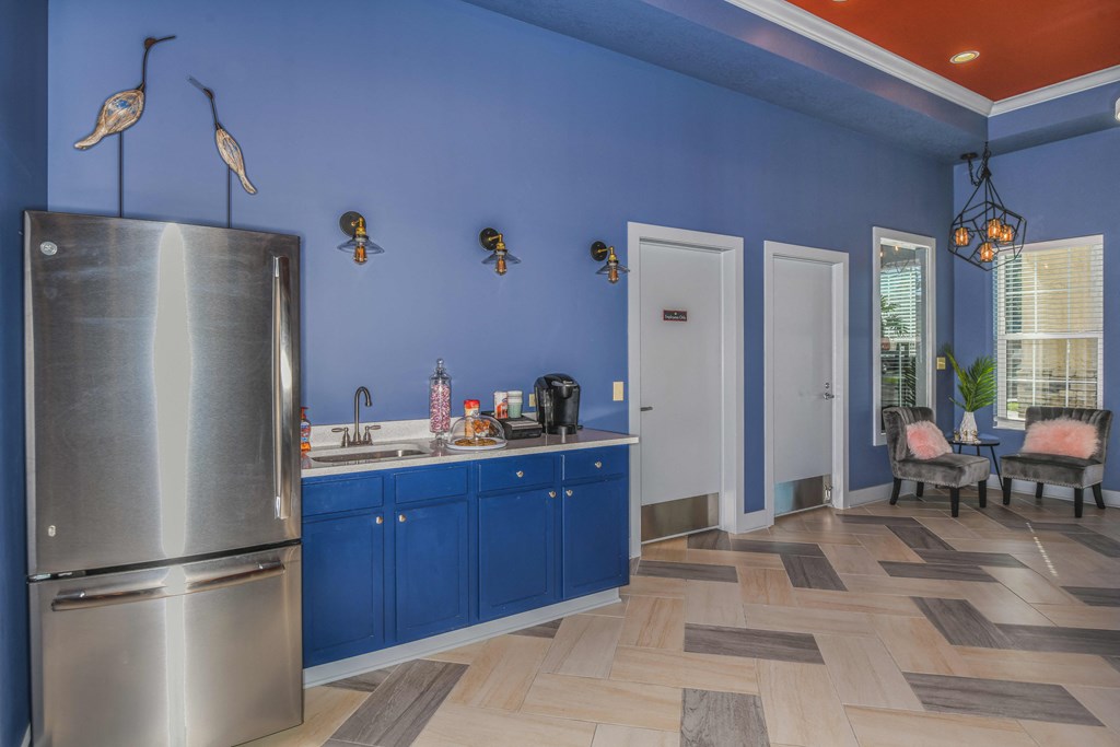 Bloomingdale Woods Apartments Valrico Florida Clubhouse Interior with Refrigerator, Coffee Nook, and Seating Area