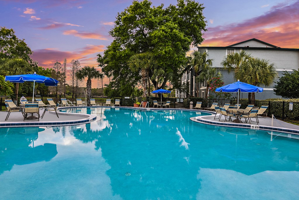 View of Brookside Manor Pool at beginning of sunset
