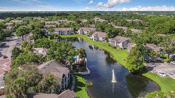 Colonial Pointe Apartments Orlando Florida Aerial Lake Fountain Property Drone - Photo Gallery 4