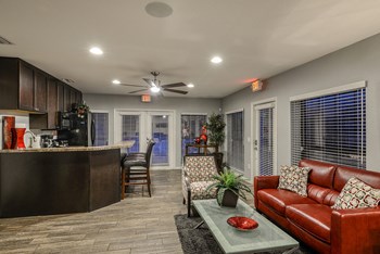 Park Avenue Apartments Tampa Florida Clubhouse Interior Renovated with Lounge Furniture and Coffee Bar