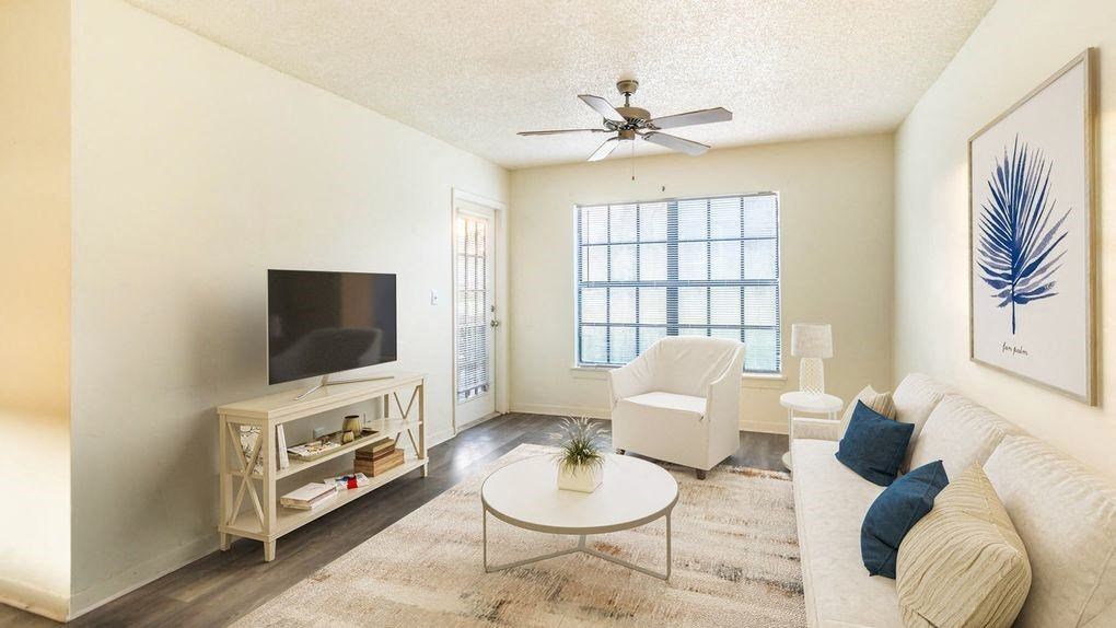 View of Brookside Manor Model Apartment Sunny Living Room with Furniture and Staging