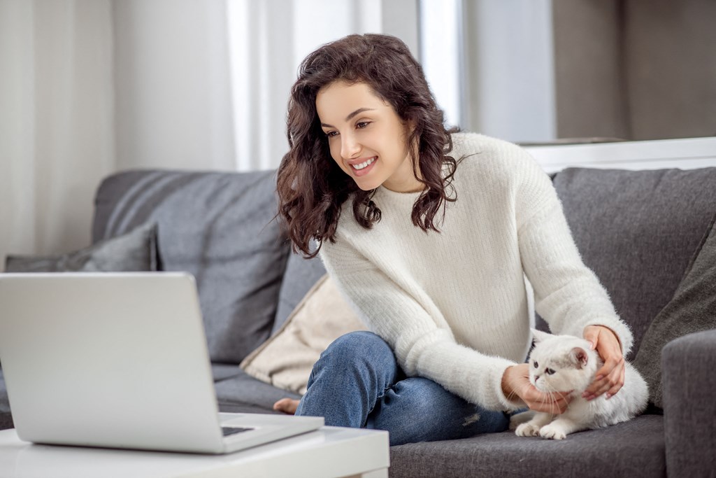 Woman on couch with cat