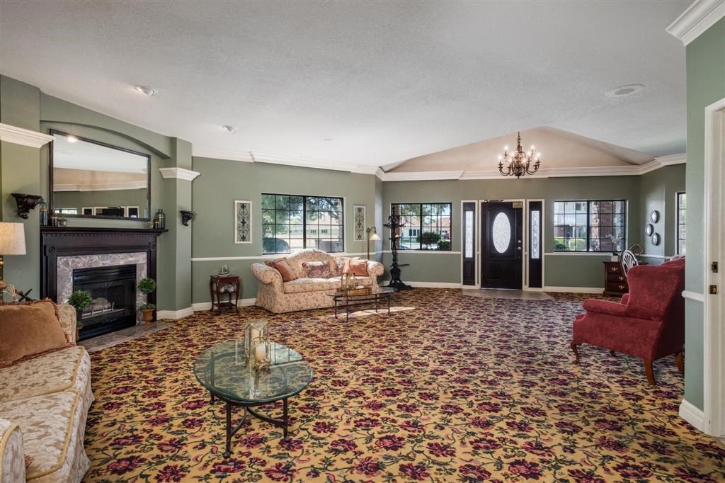 Lounge Area With Fireplace at Oxford Park Apartments, California, 93720