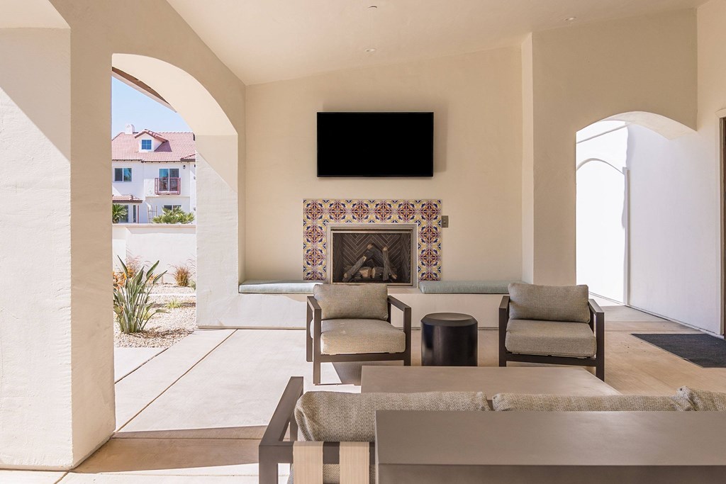 Fireplace Lounge With TV at The Villas at Ellis Manor, Fresno