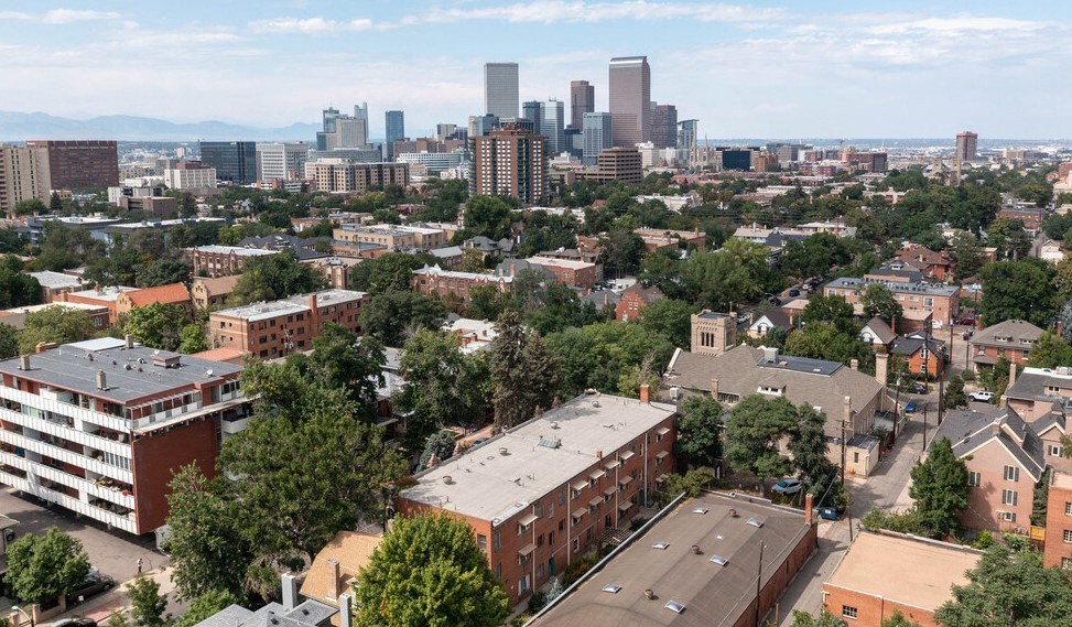 an aerial view of the city with the skyline in the background