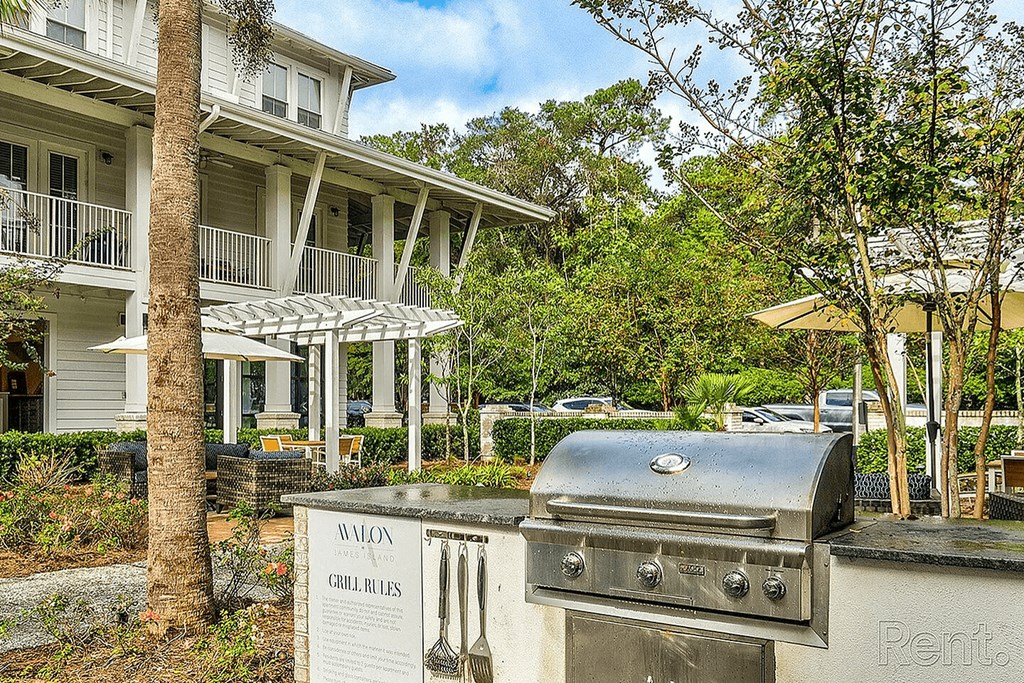 A grill with a sign that says