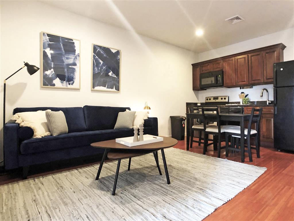 a living room with a couch and a table