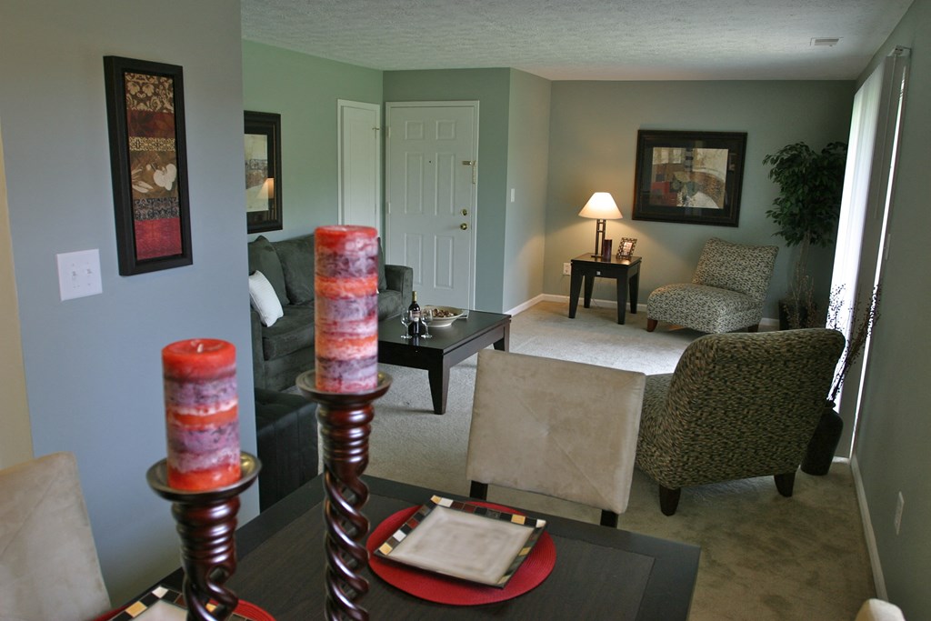 a living room with a couch and a table